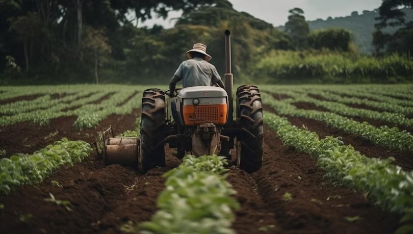 A farmer tilling land