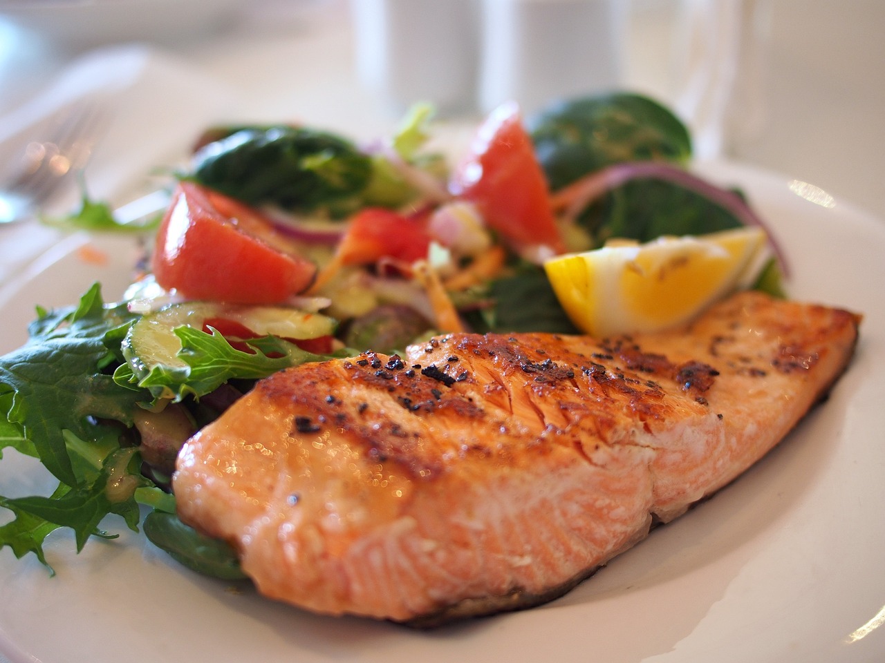 Salmon served with vegetables
