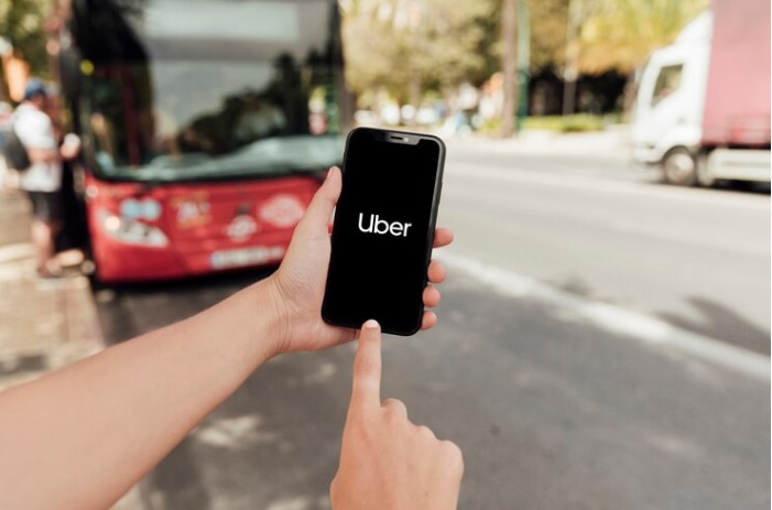 A public bus and Uber app